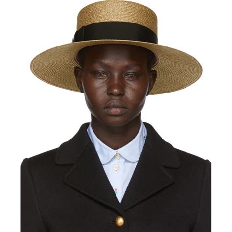 gucci gold straw hat|black tiger gucci hat.